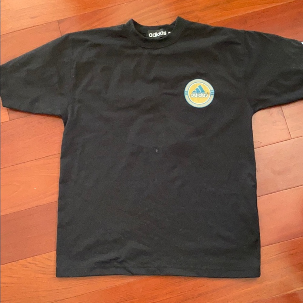 Adidas brand with three stripes shirt